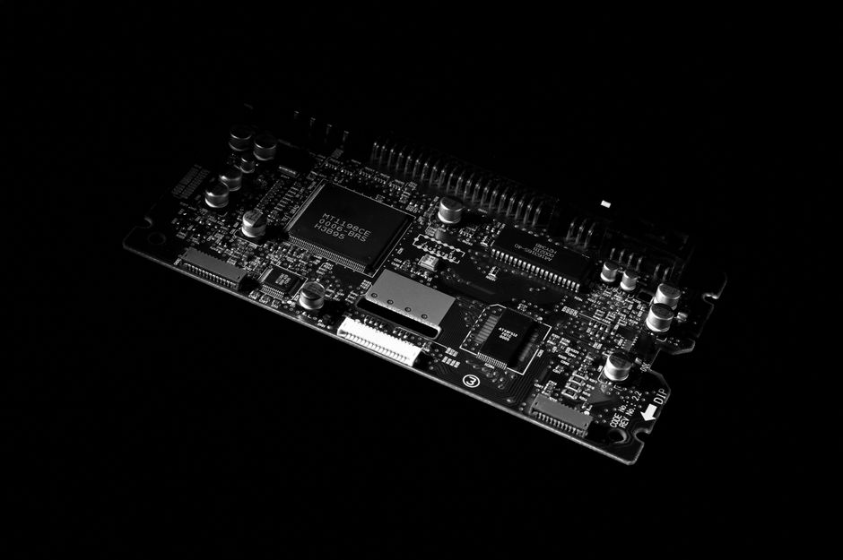 Detailed black and white image of a computer circuit board